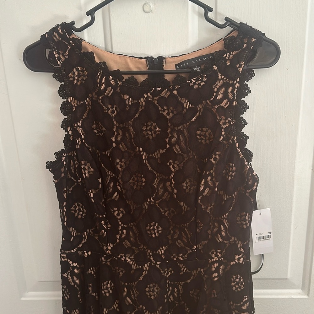 Brand new black lace with nude color under dress